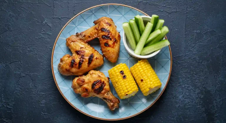 Nandinos 3 Chicken Wings with optional sides Corn on the Cob and Long Stem Broccoli